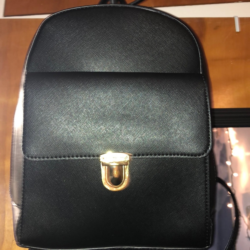 Black and gold backpack purse